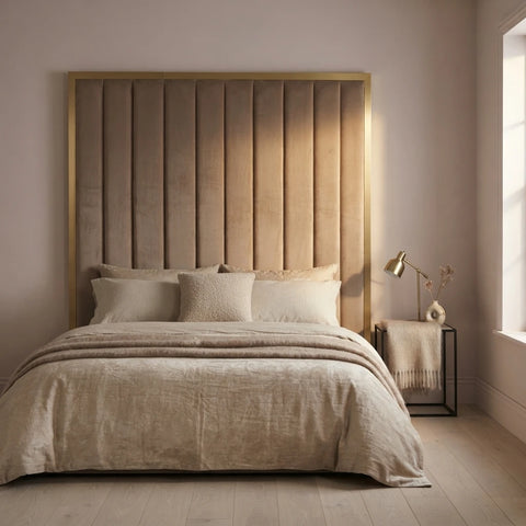 Wall mounted headboard with a gold frame detail styled in a contemporary Irish bedroom - Interio